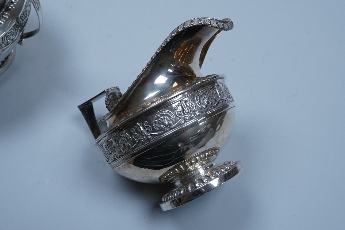 A George III Scottish silver two handled sugar bowl and matching cream jug, Robert Gray & Son, Edinburgh, 1814, sugar bowl height including handles, 11.5cm, 22.8oz.